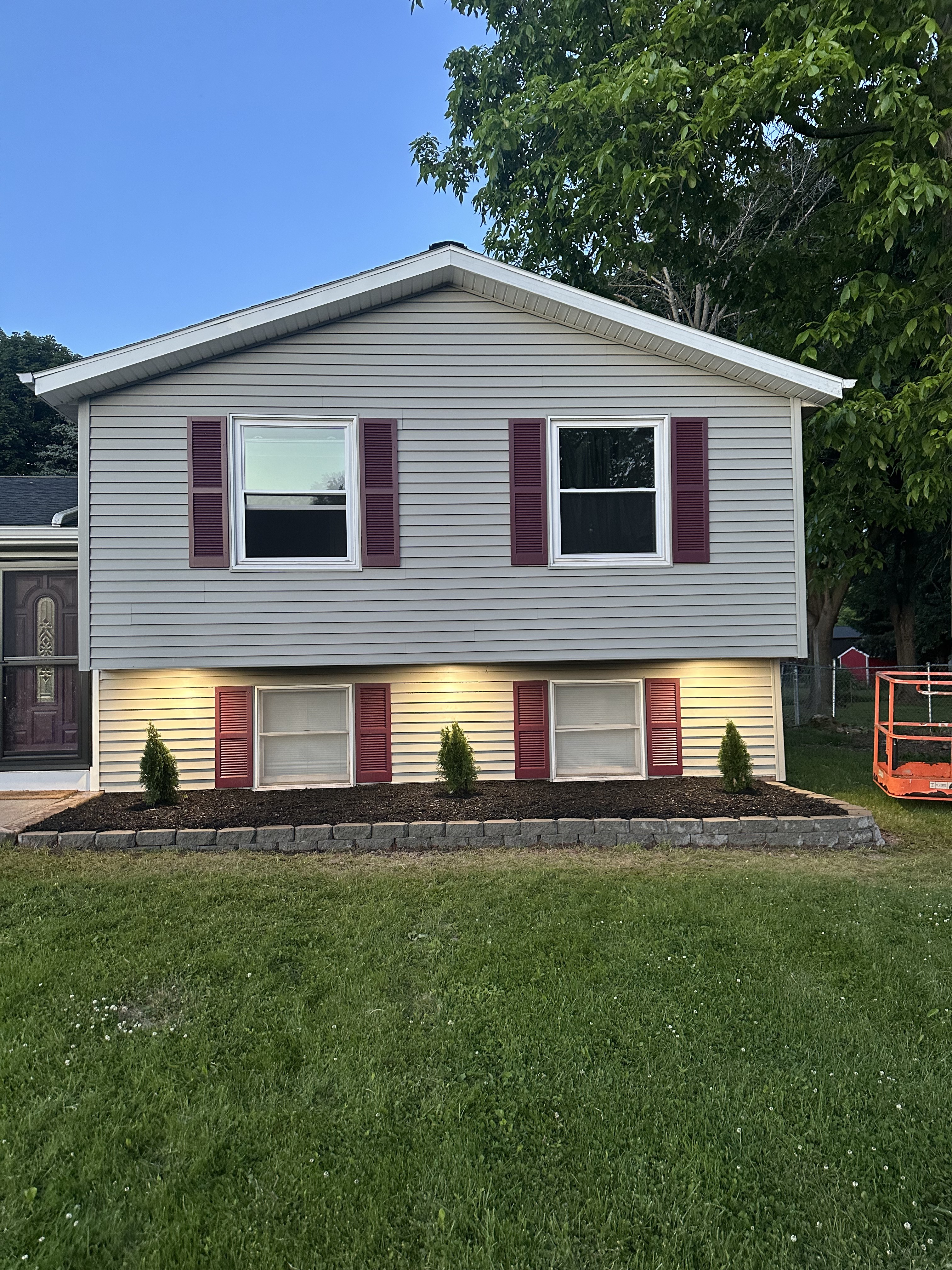 Residential exterior landscape uplighting installation by Premier Alarms and Electric โ Monroe County NY