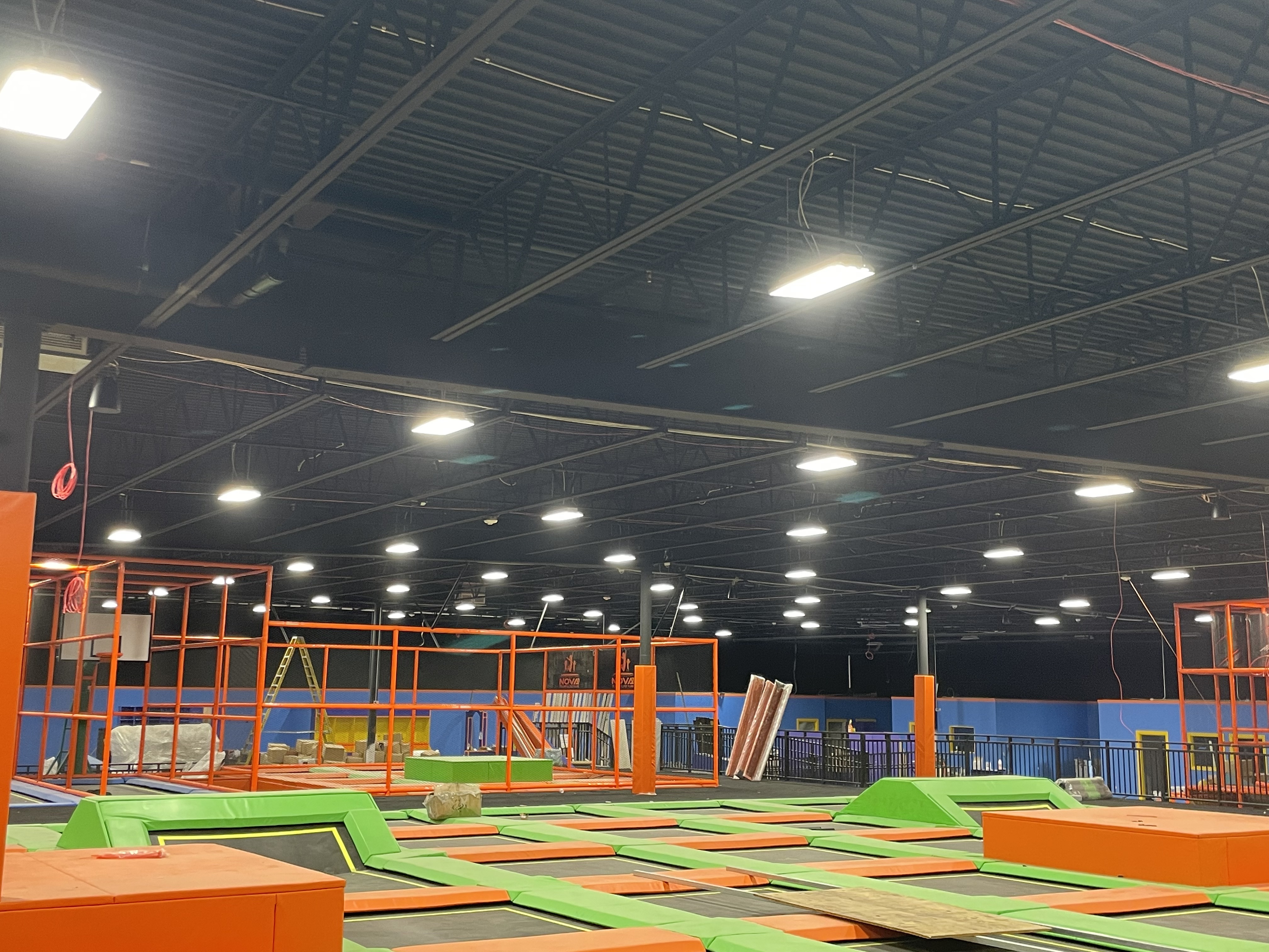 Commercial high-bay LED lighting installation trampoline park by Premier Electric Monroe County NY