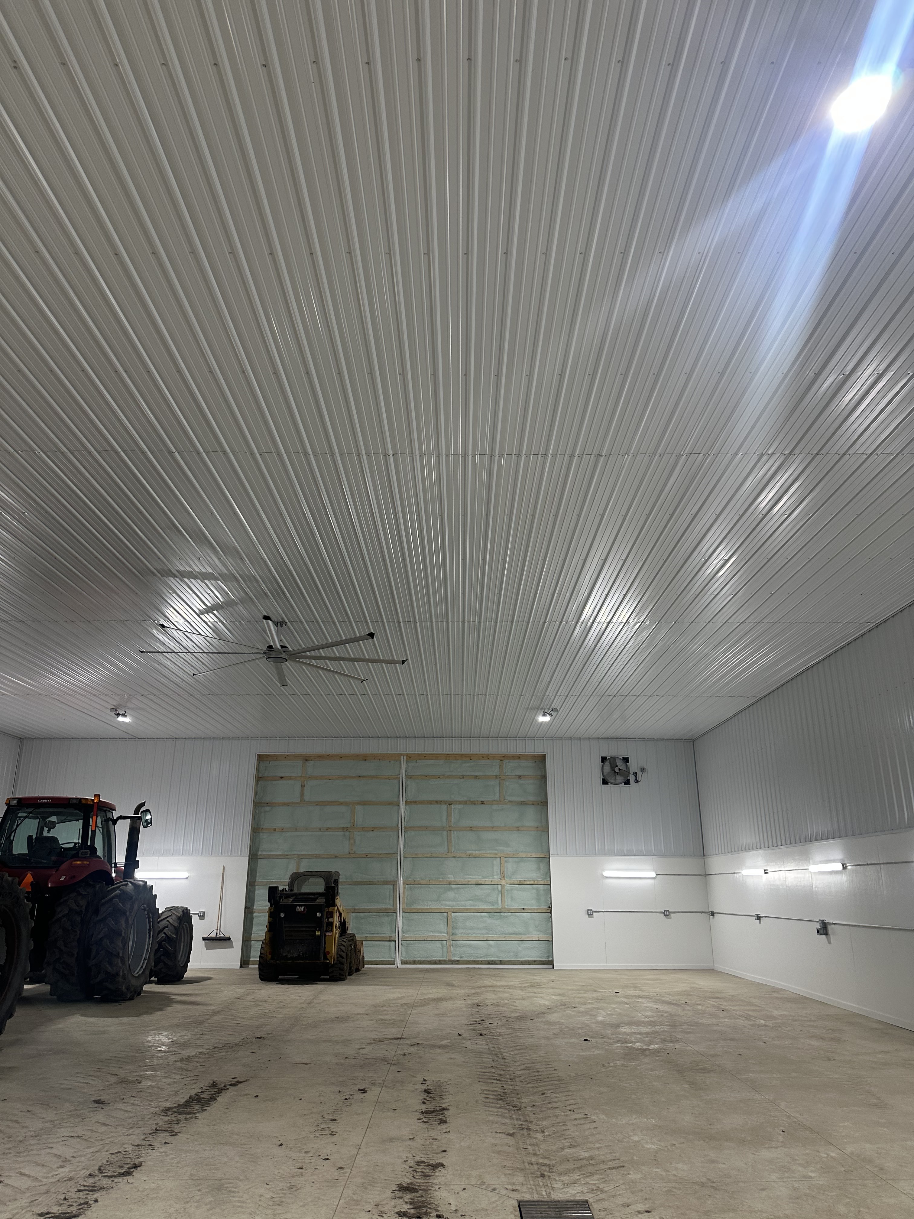 Large agricultural building full electrical build-out with HVLS fan, LED lighting by Premier Alarms and Electric โ Monroe County NY