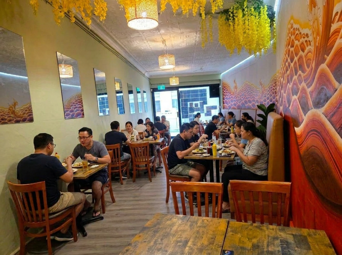 Thai Baan dining room featuring Chef Witt's hand-painted mural