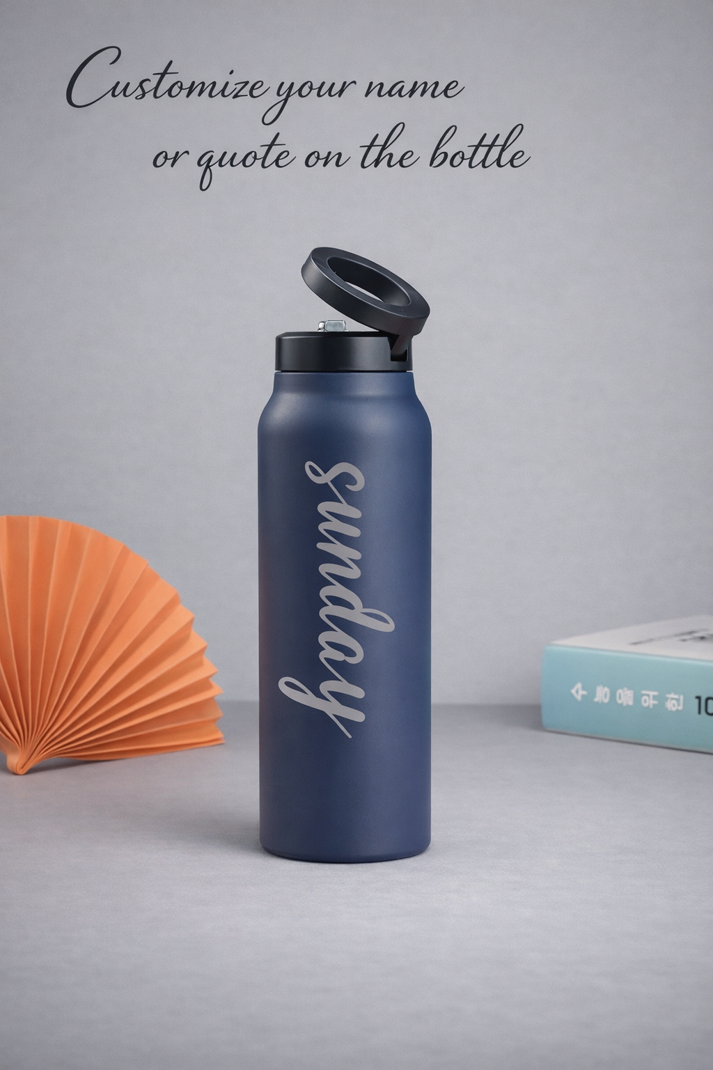 Navy blue HydroMount bottle with custom Sunday engraving