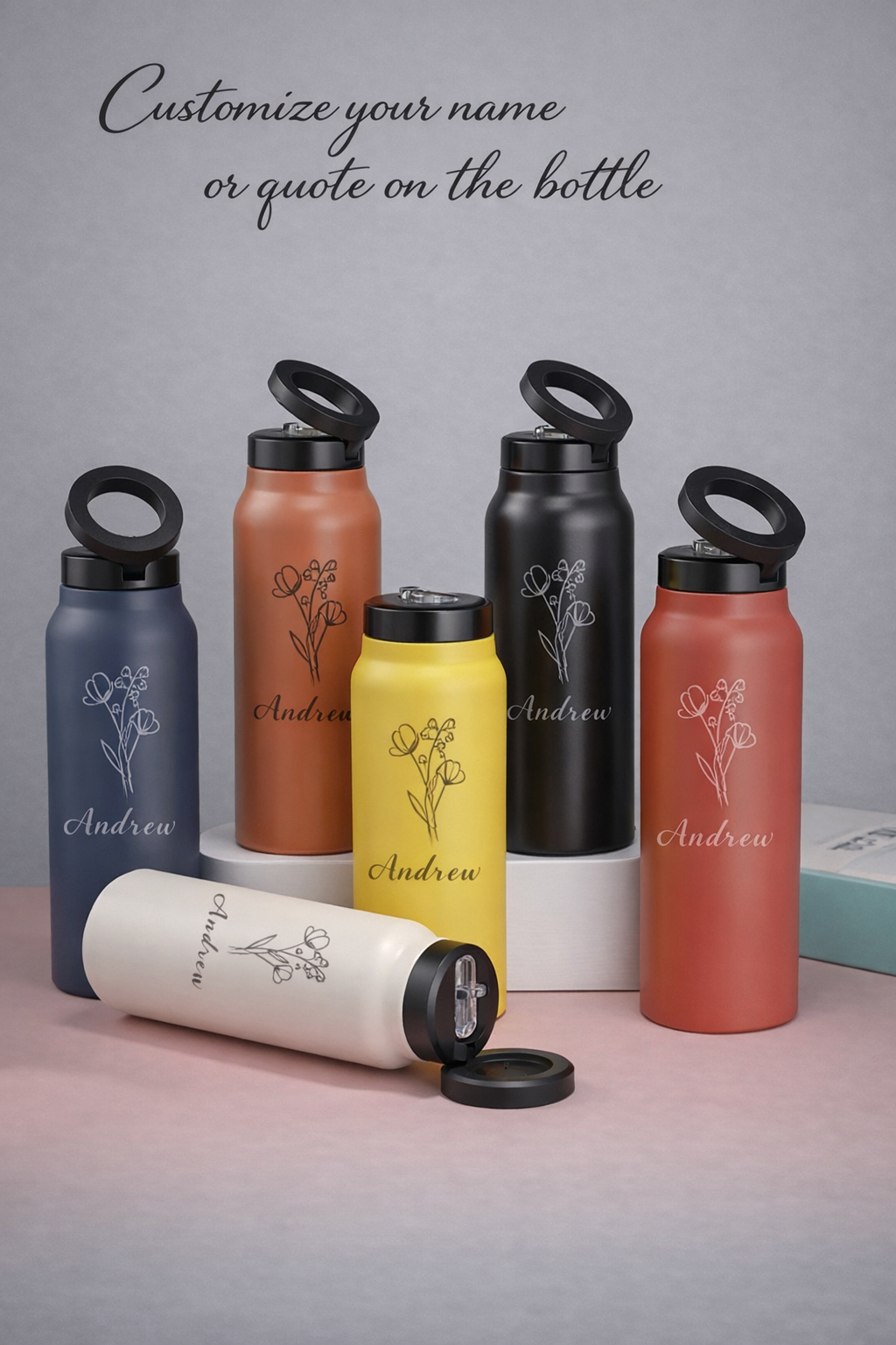 HydroMount bottles available in navy, brown, yellow, black, coral, and cream with custom name engraving