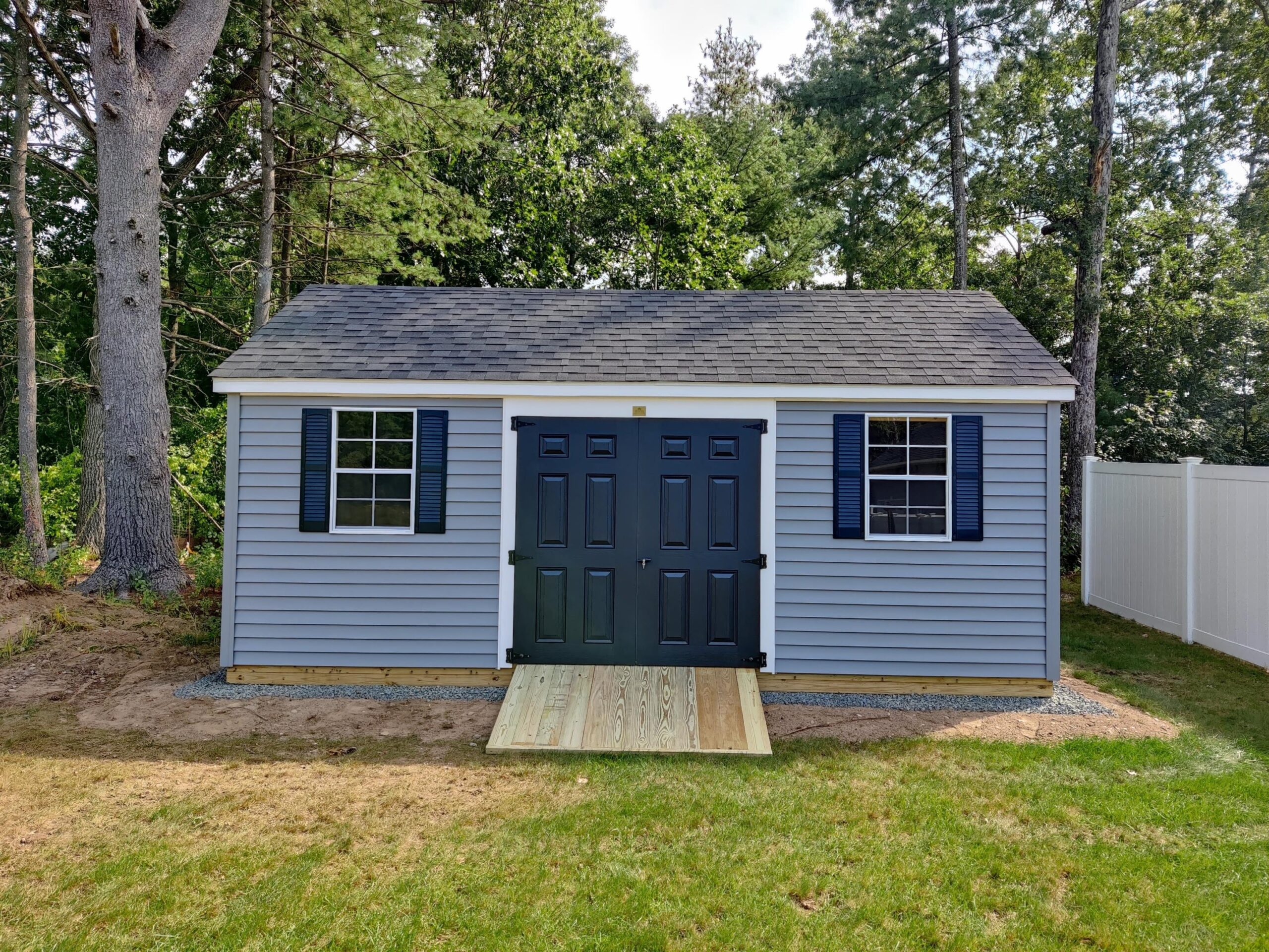 Econoline Cape shed — real Hometown Structures Cape photo, full shed