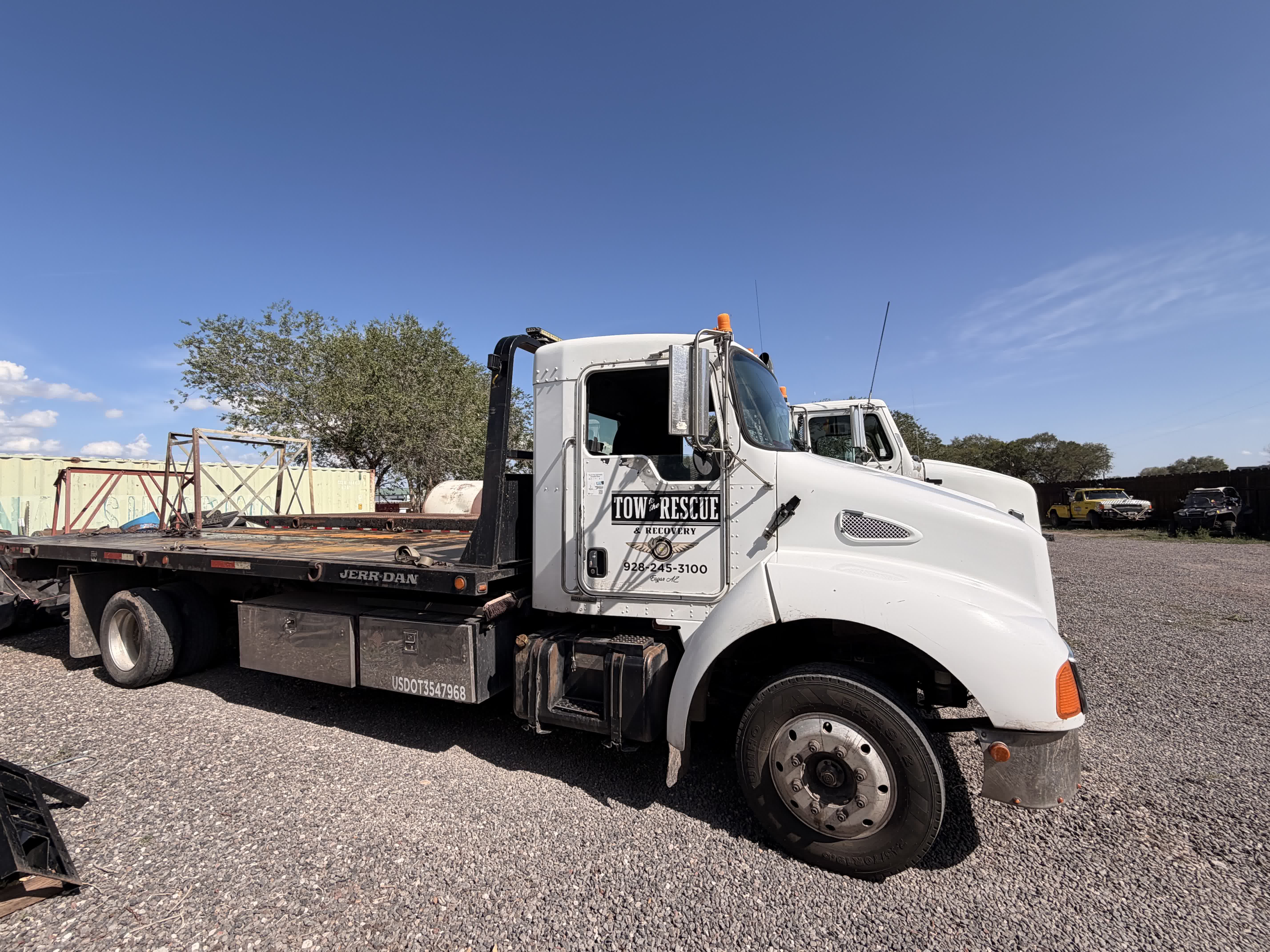 Tow to the Rescue flatbed tow truck