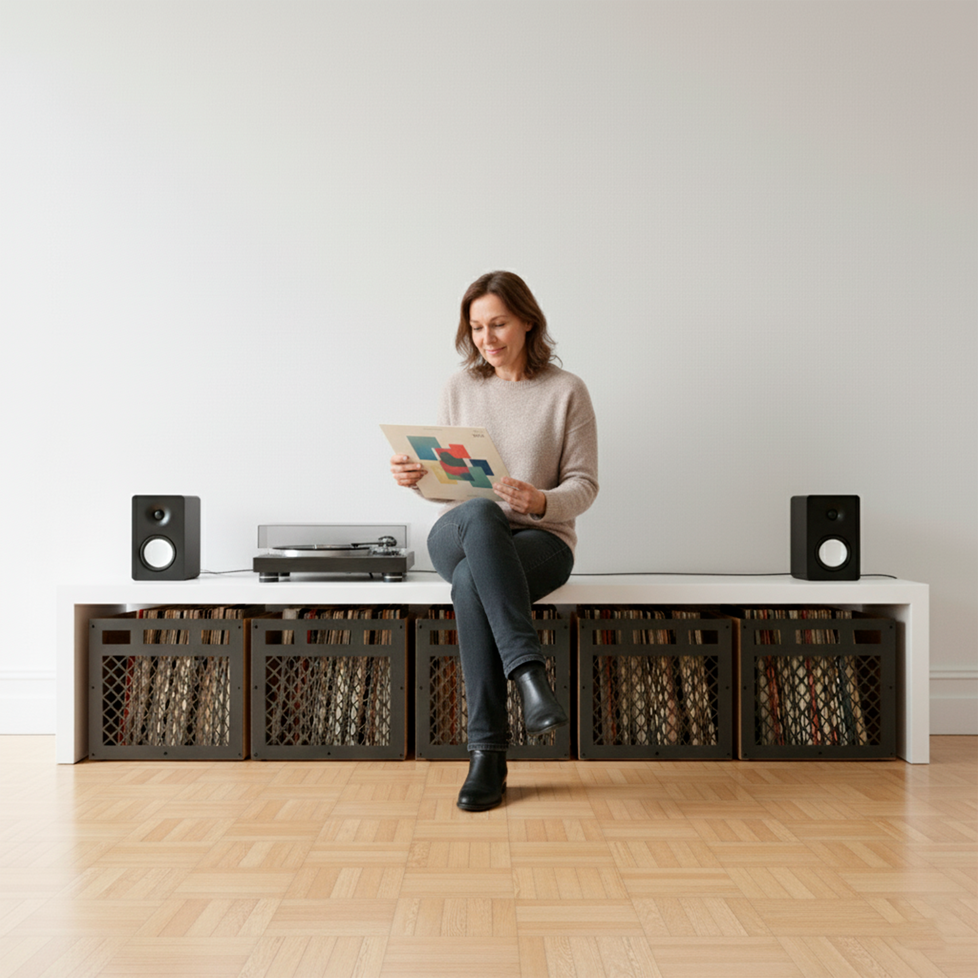 Woman enjoying vinyl records with turntable and Keep Them Spinning storage system