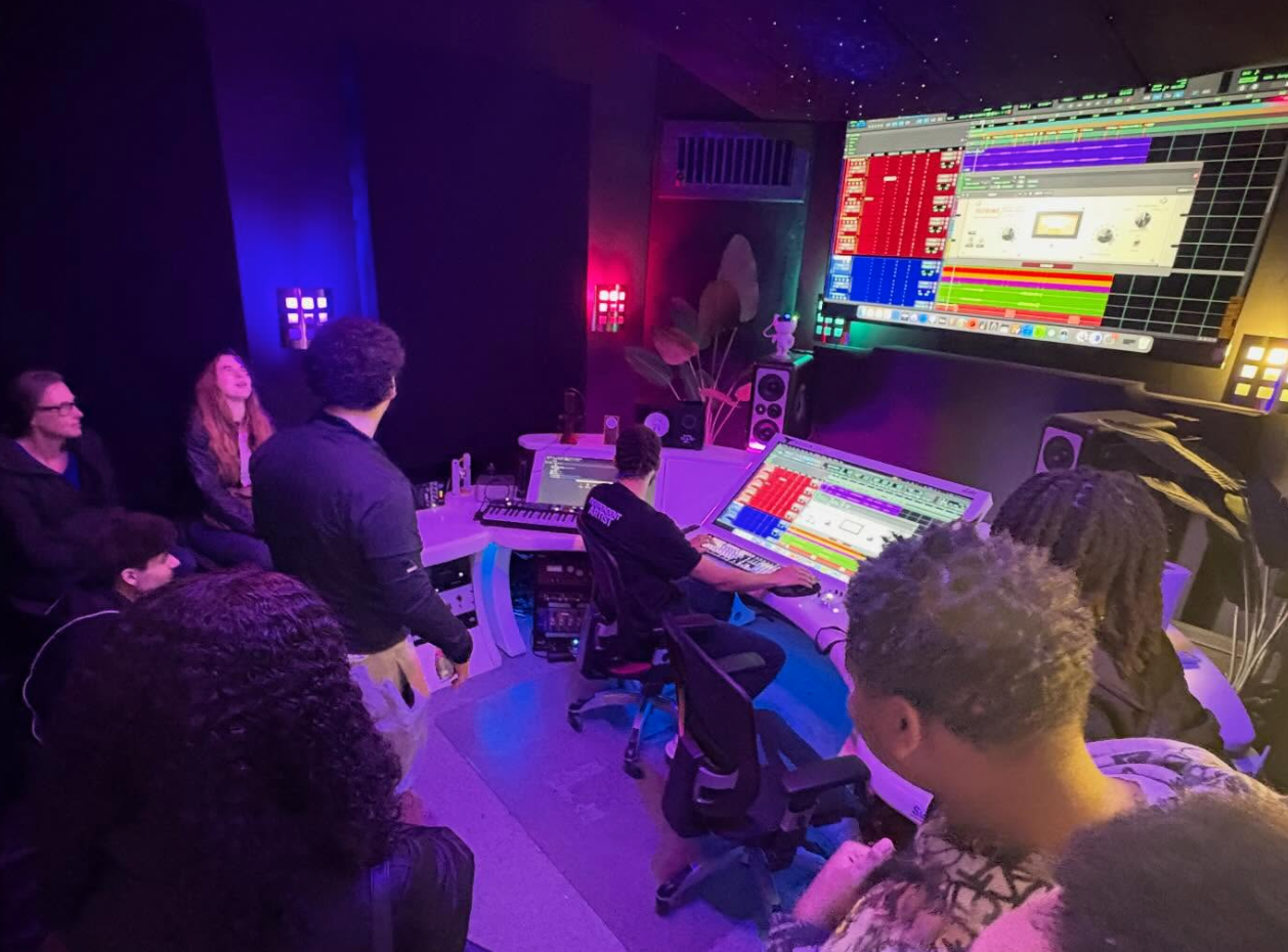 Engineer teaching at the console during a Trilogy workshop