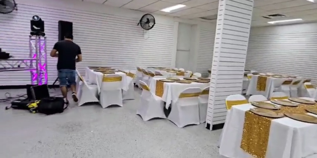 DJ setup with white and gold decor