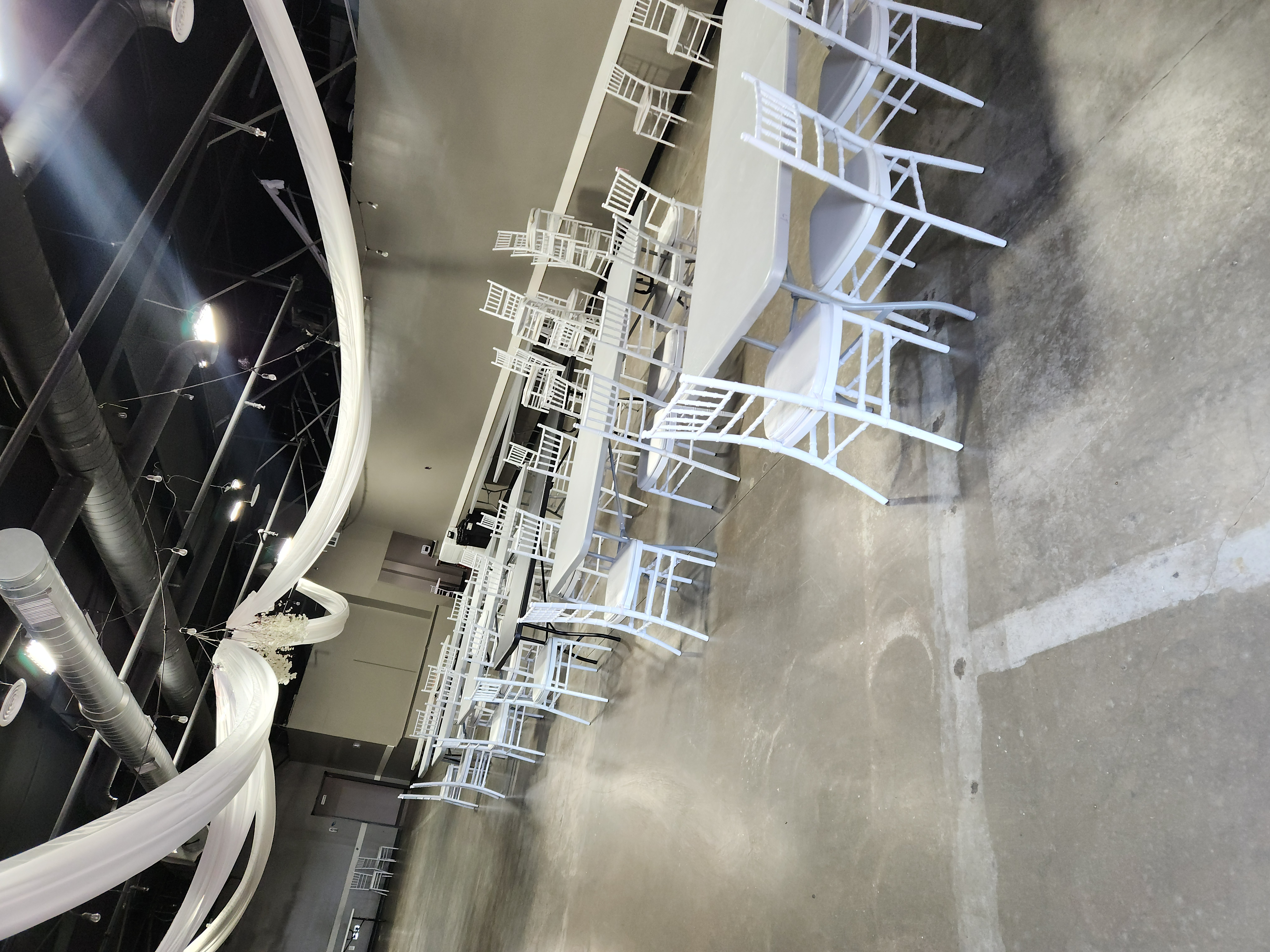 White draping and chiavari chairs