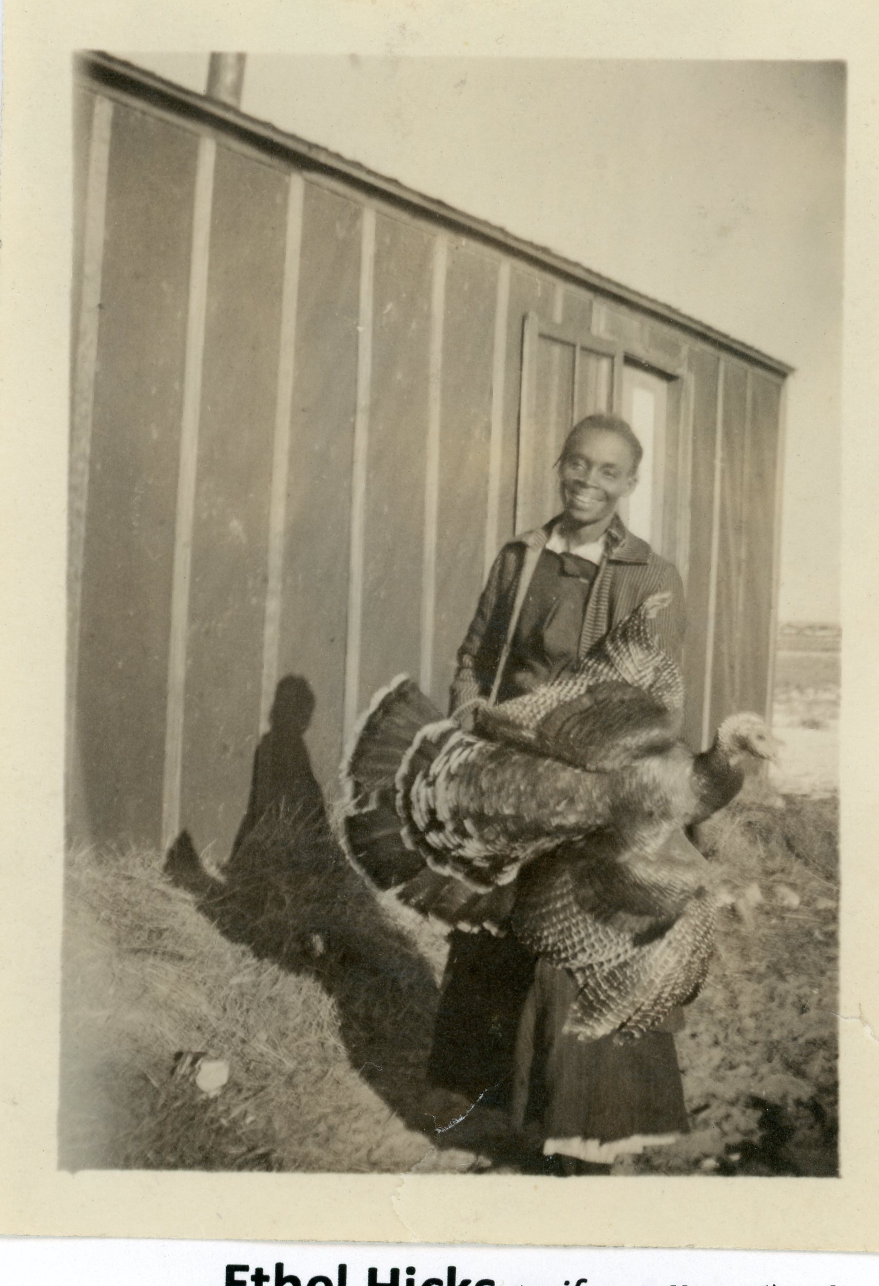 Ethel Hicks holding a large turkey