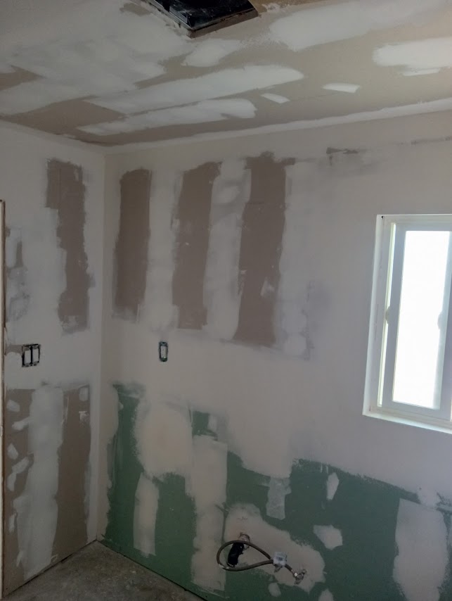 Drywall patching and sanding — clean finish by PMR Projects